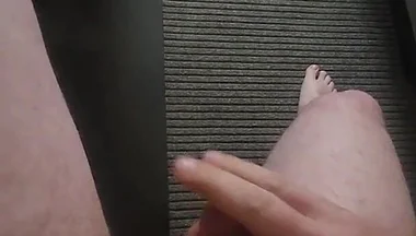 Jerkin While Nude in the Hotel Window.