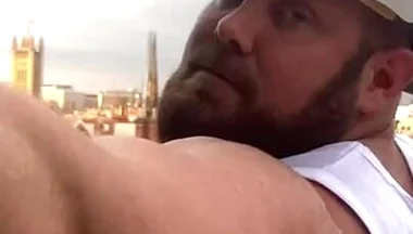 Builder Iron Bending Muscle Flexing and Measuring