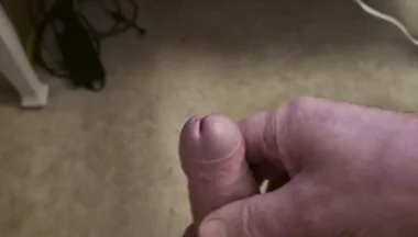My Friend Sits in a Chair and Jerks off His Cock While Watching Video