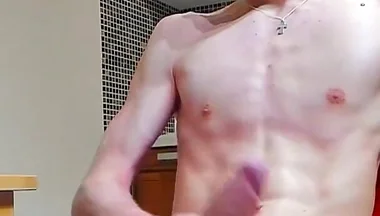 A young beautiful gay twink fucks a vibrator