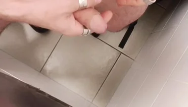 Jerking off a Cock in a Public Toilet