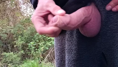 Moaning Squirting Cumshot Wanking in the Woods Wearing Onesie