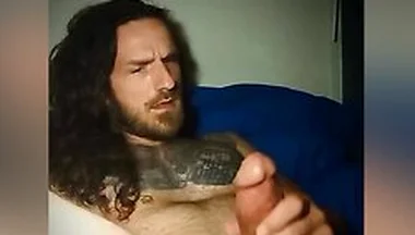 Long Hair And Tats Strokes Cock Until He