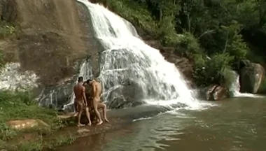 Three Nude in the River