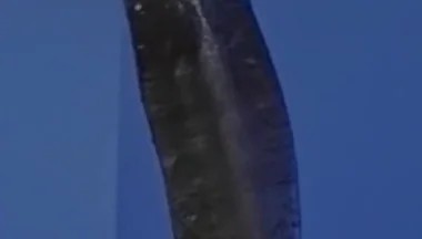 Sucking a Huge Black Cock in a Glory Hole