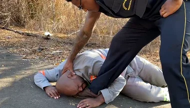 Vigilante Humiliating the Worker