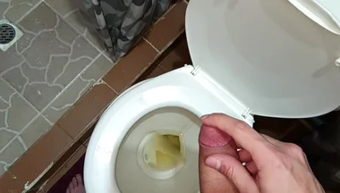 Two Shots of Cum on the Pee in the Bathroom