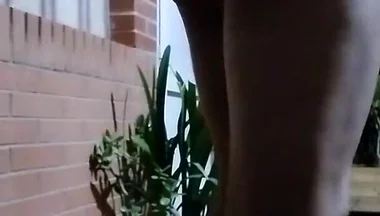 In the Doorway in a Thong and with an Anal Plug