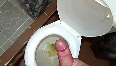 Two Shots of Cum on the Pee in the Bathroom