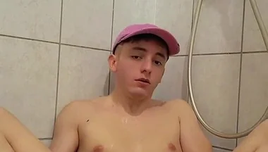 Young Twink Plays with His Piss and Jerks off