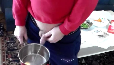John Is Pissing Into a Kitchenpot