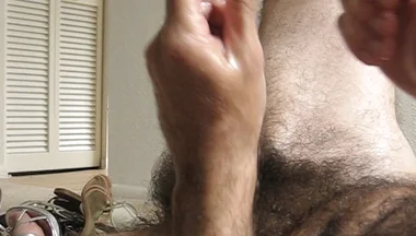 Jacking off While Wearing High Heels and Feet Chained Together