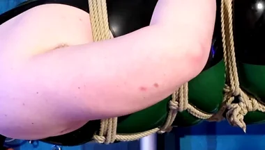 The Chastity Slave Is Bound in Ropes and Tormented with Feet
