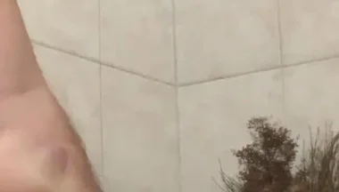 In the bathroom with a beach ball