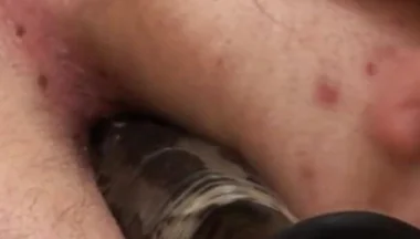Threesome gay action with dildo involved