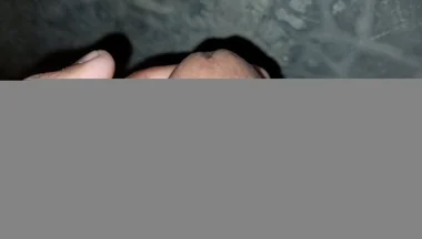 The Gay Boy Went to the Toilet, Turned on the Flash Light on His Mobile Phone, and Started Licking His Private Parts with Spit.