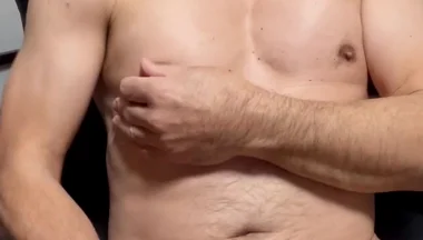 Masturbating