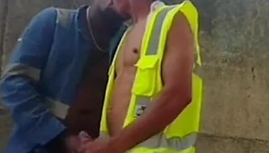Two Workers Behind the Service Wall