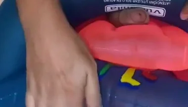 Playing with inflatable swim ring