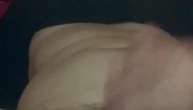 Masturbating