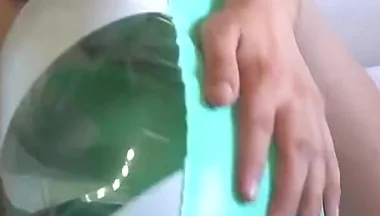 Playing with a Green and White Swimring