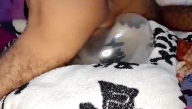 Young Man Masturbates with Inflated Comdon
