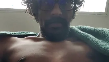 Masturbating