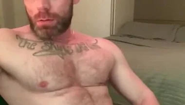 Masturbating