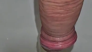Male Peeing Into the Toilet