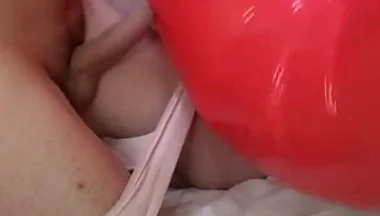 Playing with Red Swimring Pool Toy