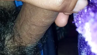 A Indian Young Boy Is Playing with His Penis Inside a Blanket