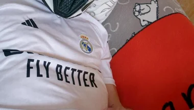 The Guy Is Wearing a Soccer Uniform and Mxhelmet with a Morning Cum