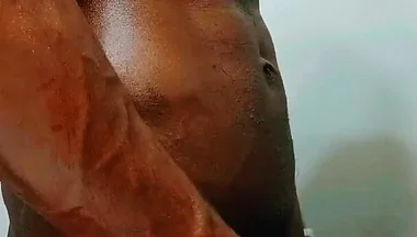 Oiling up My Big Black Cock
