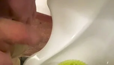Amateur Redhead Guy Caught Pissing in a Public Toilet's Urinal - He Then Quickly Plays with His Cock Before Leaving