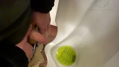 Amateur Redhead Guy Caught Pissing in a Public Toilet's Urinal - He Then Quickly Plays with His Cock Before Leaving