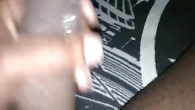 Masturbating