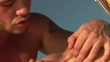 Two sea men fill each other with semen while out on the yacht