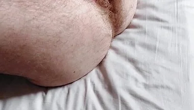 Ftm Boy Fucking His Hairy Pussy with a Huge Dildo and Squirting All Over the Bed
