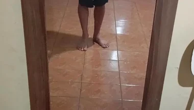 Boy in Shorts in the Mirror