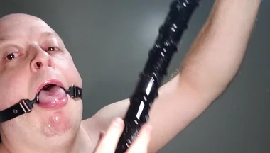 Deepthroating an 18 Inch Dildo with Mouth Gag Ring