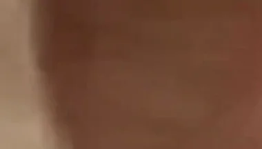 Masturbating