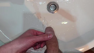 Pissing to the Bathroom Sink