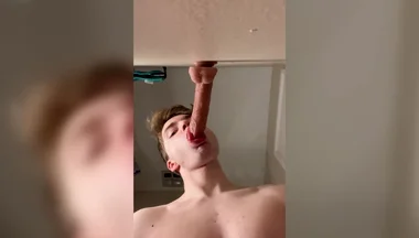 Cock Hungry Twink Slobbers on Giant Dildo!