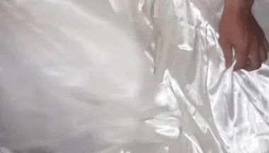 Cum Flows on Satin Wedding Dress