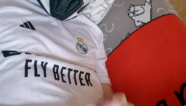 The Guy Is Wearing a Soccer Uniform and Mxhelmet with a Morning Cum