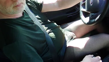 Nylonjunge Driving Car in Black Pantyhose