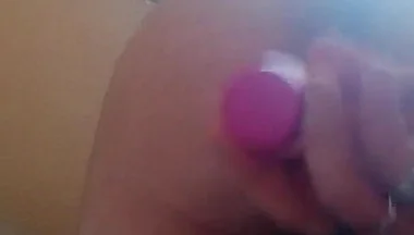 Strapon fucks herself in the ass