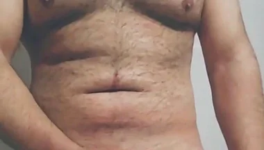 Hairy Big Man Playing with His Dick