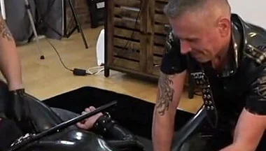 Rubber Gimp Bound and Used by Two Latex Guys Part 1