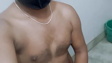 Masturbating